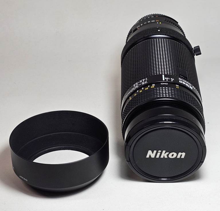 A superb Nikon AF 75-300mm f4.5-5.6 zoom lens in pristine, as new condition.