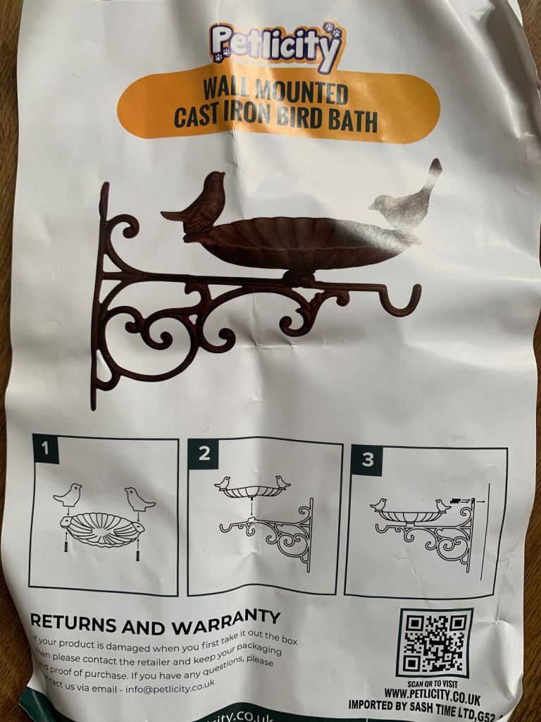 Cast iron wall mounted bird bath