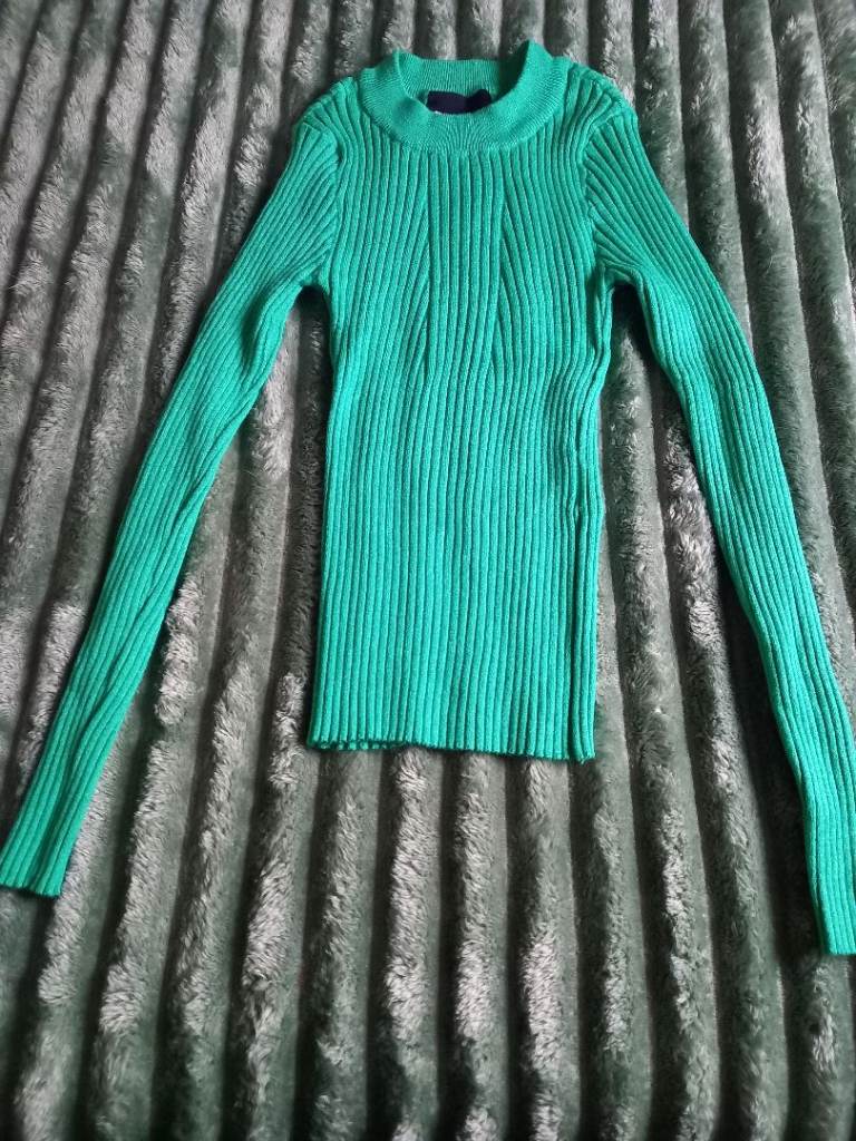 New tight fitting top, size small