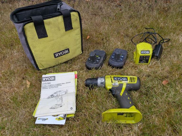Ryobi cordless hammer drill with 2 batteries, charger and bag