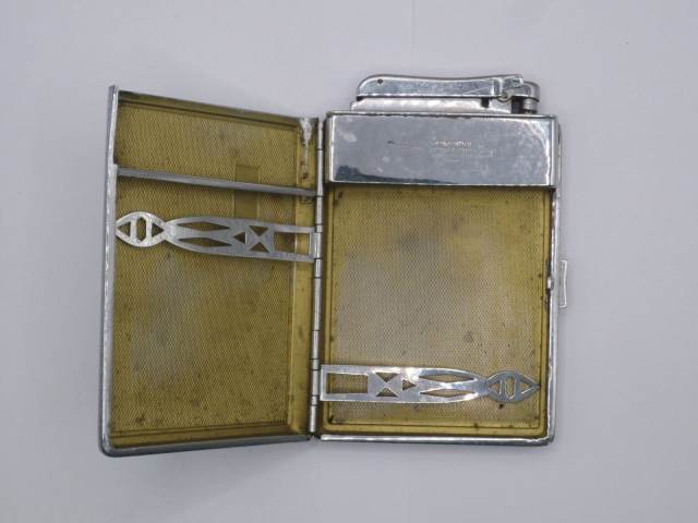 colibri lighter and cigarette case Combination Silver & pocket change and other abrasive objects Colibri Cigarette Lighter & Cigarette
