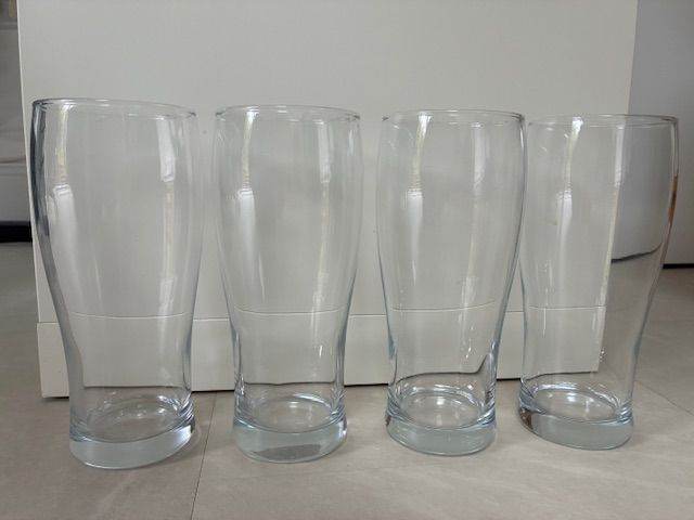 Set of four beer / pint glasses