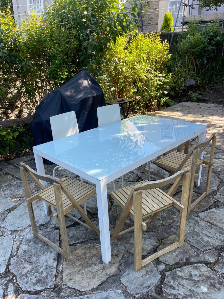 Glass top garden table