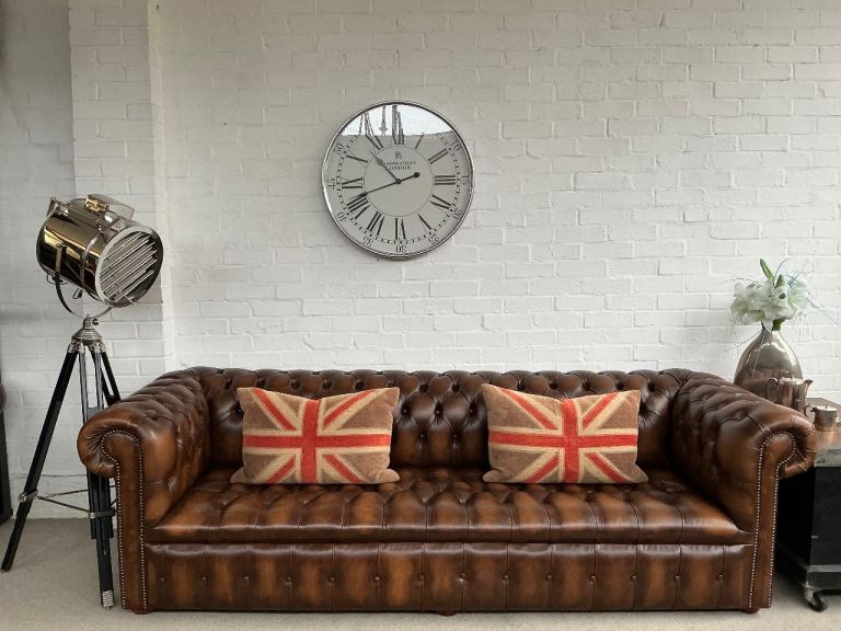 Immaculate 4 Seater Chesterfield Sofa. Matching pair available. Can deliver.