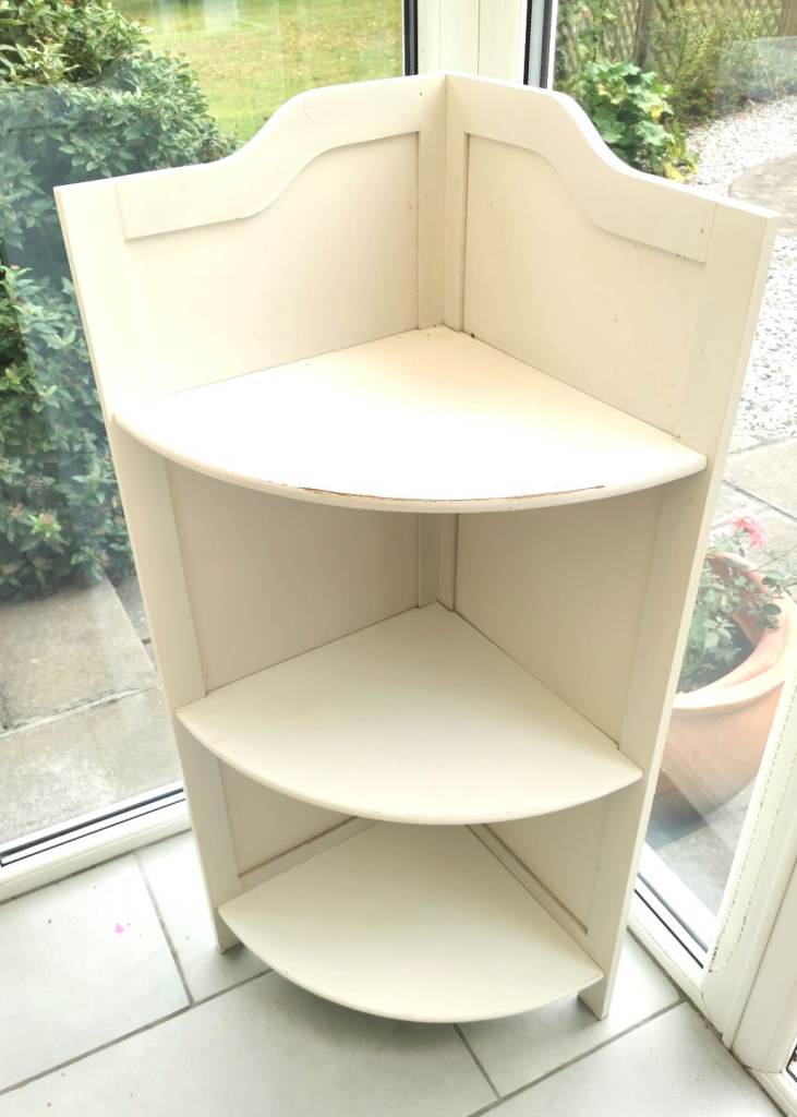White painted shelving unit