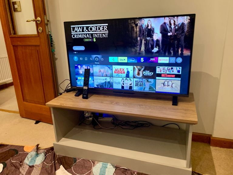 Toshiba 40 Inch smart TV. With TV shelf if needed