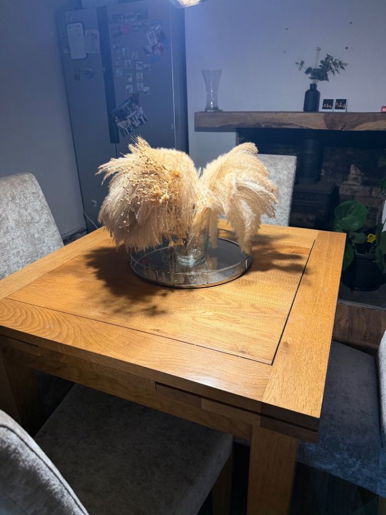 Solid oak dining table & chairs