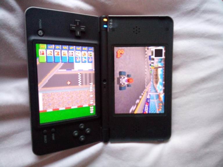 Nintendo dsi xl with Mario Kart & Animal Crossing 