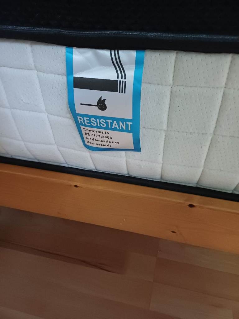 3/4 Double Bed, pine wood construction, nearly new mattress. 
