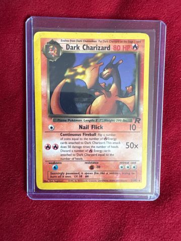 pokemon card value dark charizard Is this worth grading? Encased in a durable acrylic holder to highlight the vibrant artwork of this fan What is the value of
