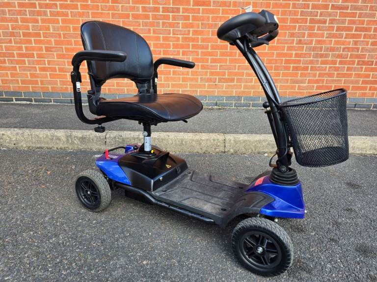 Strider st1 car boot mobility scooter 