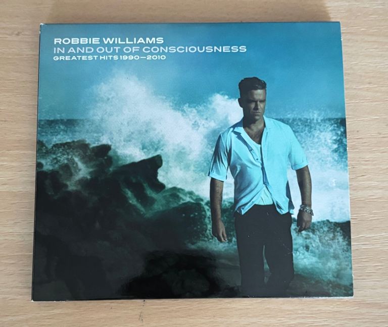 Robbie Williams | In and out of consciousness | Greatest Hits 1990-2010 | 2 CD album