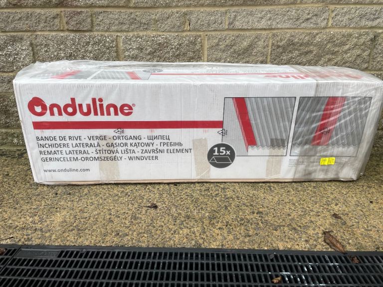 Two BRAND NEW Onduline intense grey bitumen verge pieces