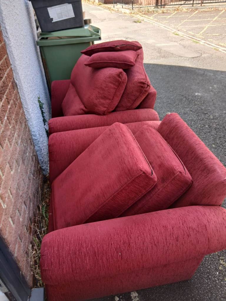 Two red arm chairs 