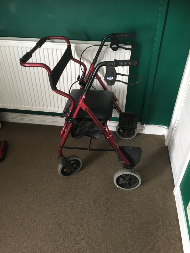 Days Red Mobility Walker with Seat and Storage and can use as a wheelchair  –3 in 1  Good Condition