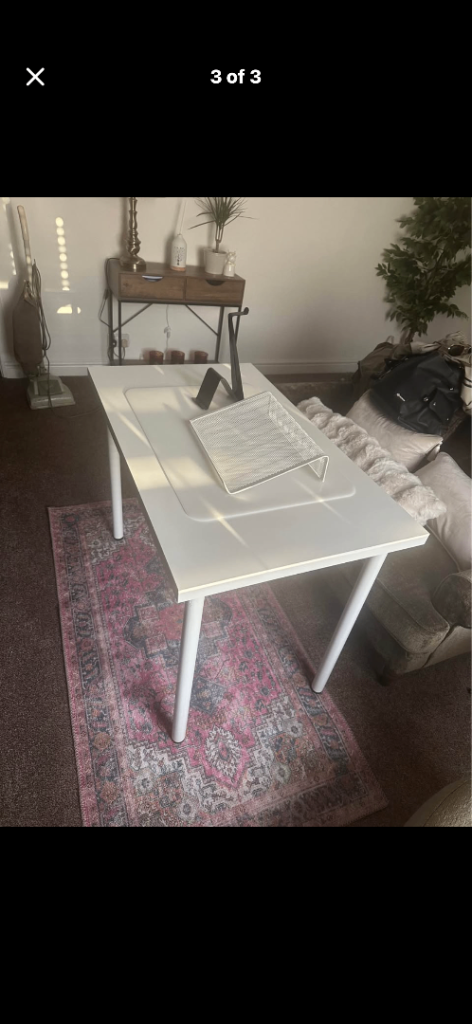 White office desk and accessories 