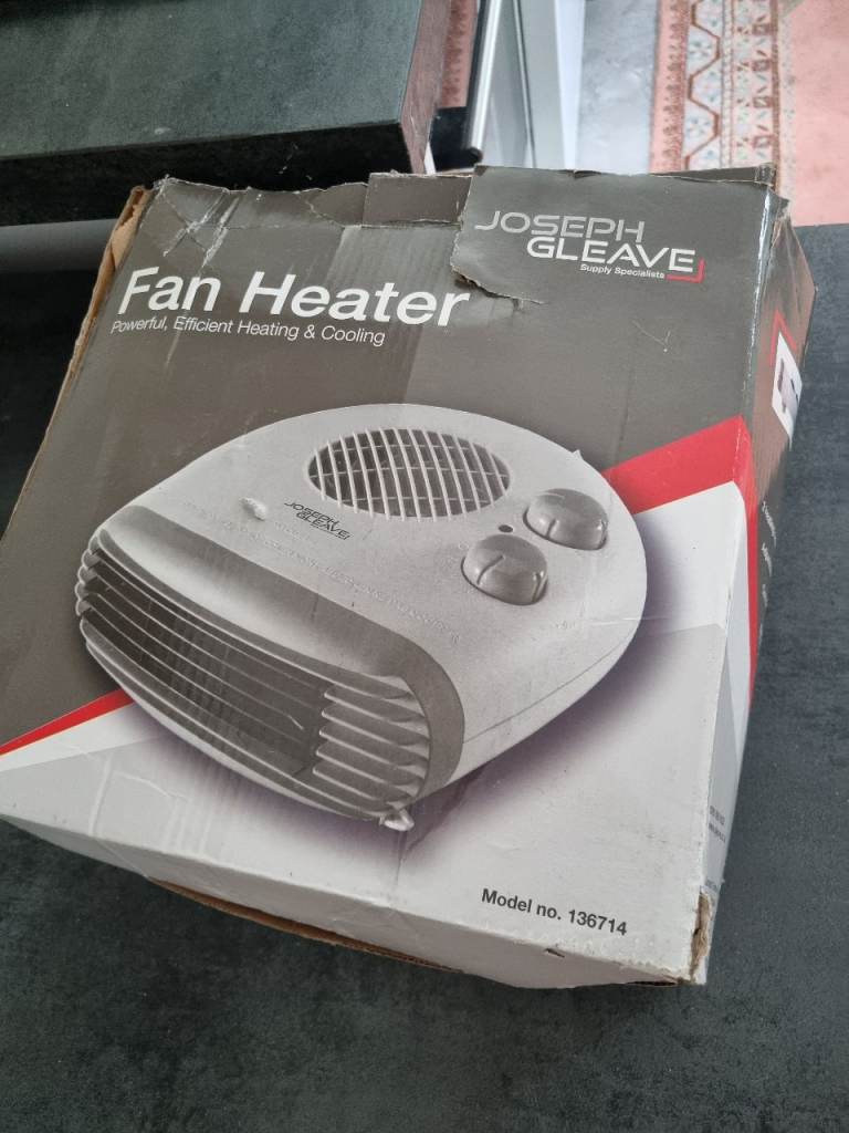 Portable electric fan heater Easy to move around, ideal for home, office, garage or workshop