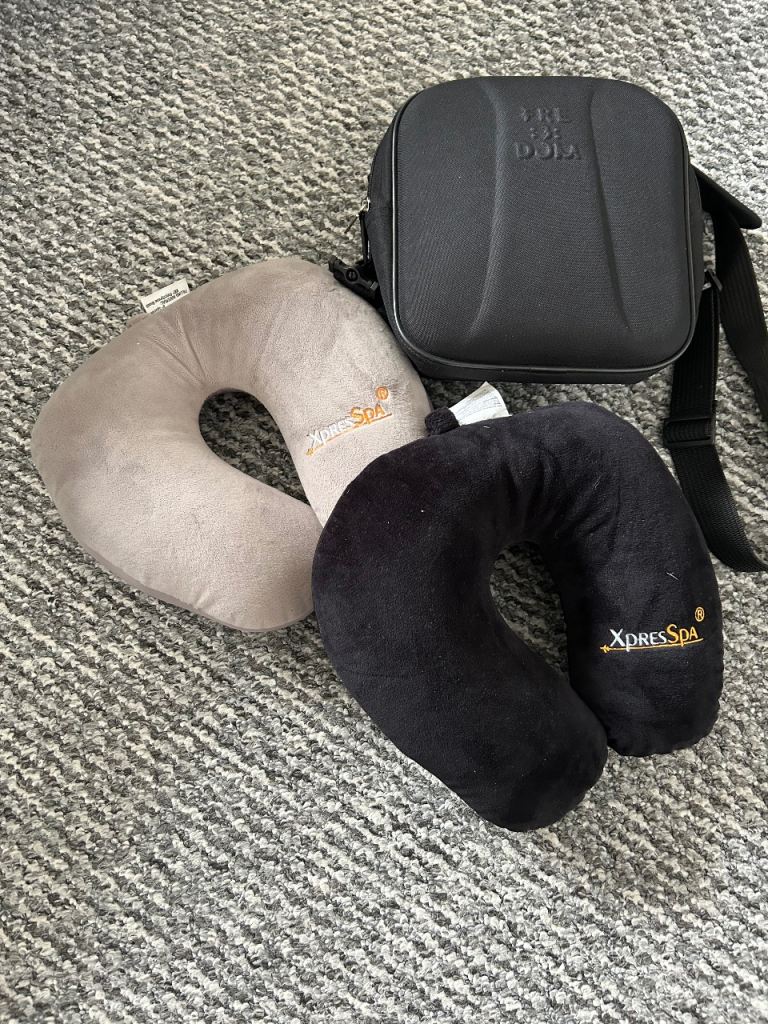 Small travel documents bad , and two neck pillows 