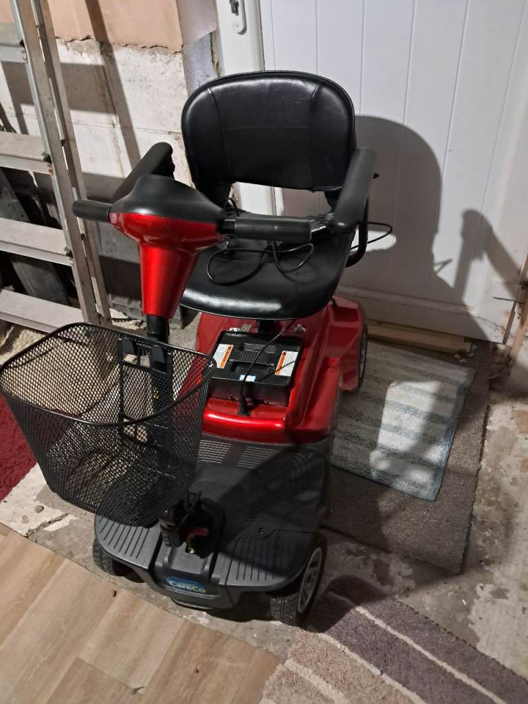 Red Mobility Scooter with Front Basket – Good Condition