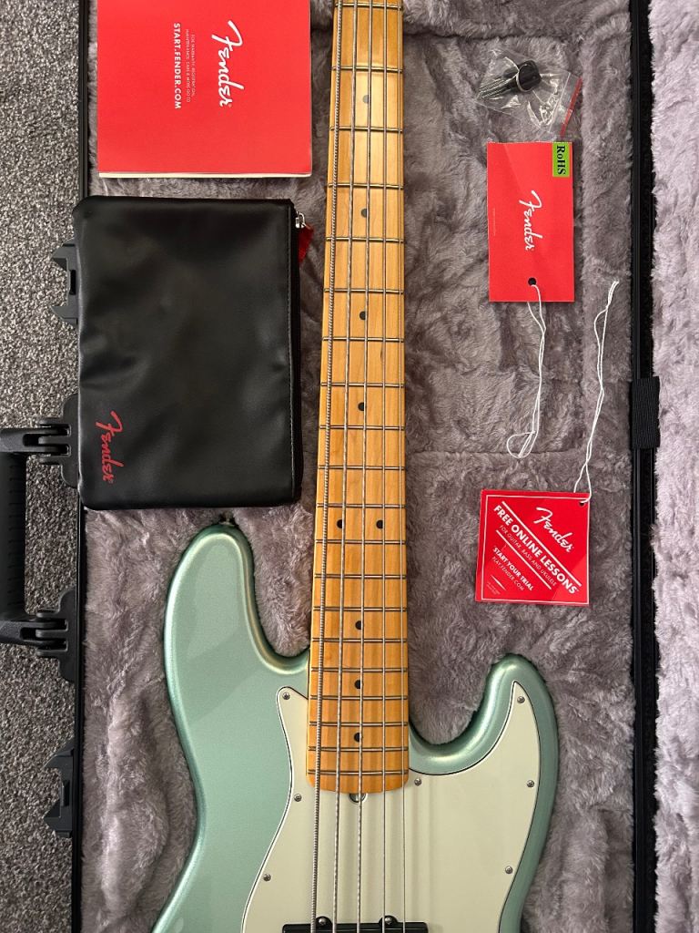 New Fender Amarican Pro ll 5 string in metallic surf green.
