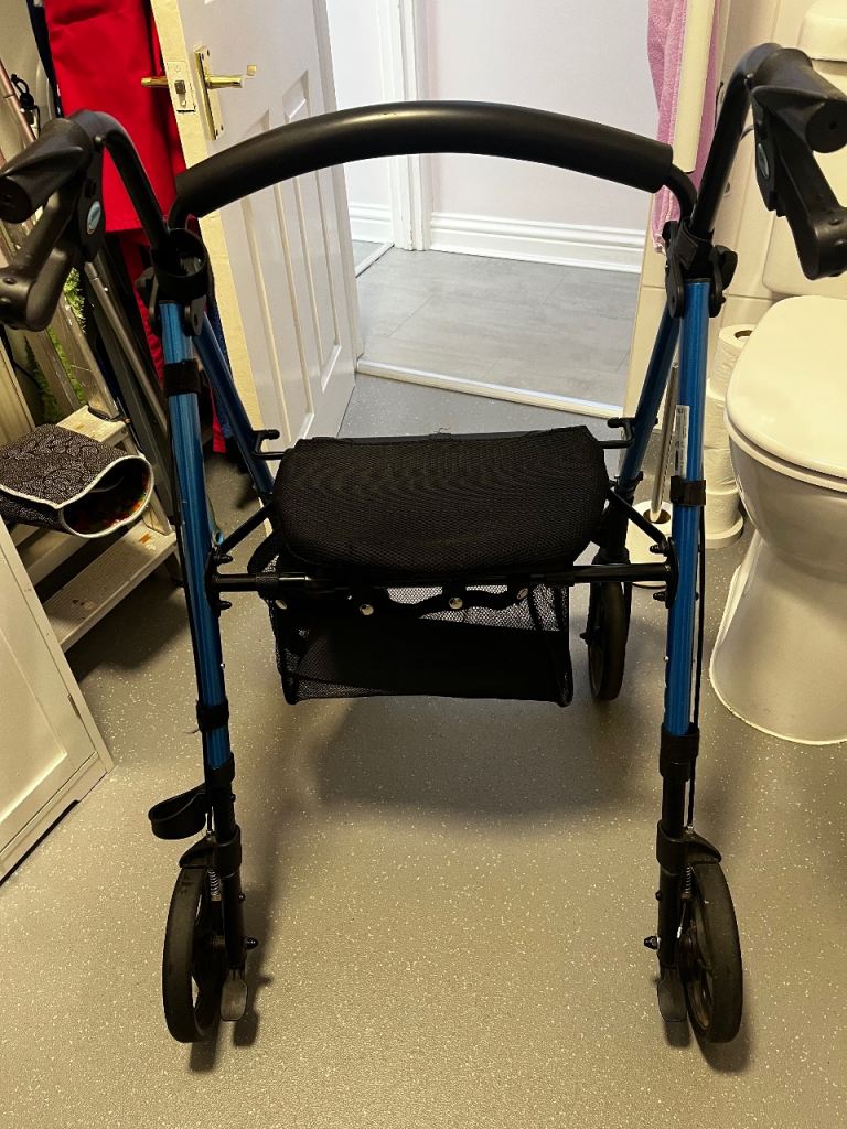 Mobility walker with seat