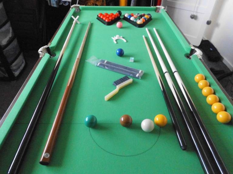 6ft snooker/pool table with folding legs and levelling feet hardly used with extras must be seen