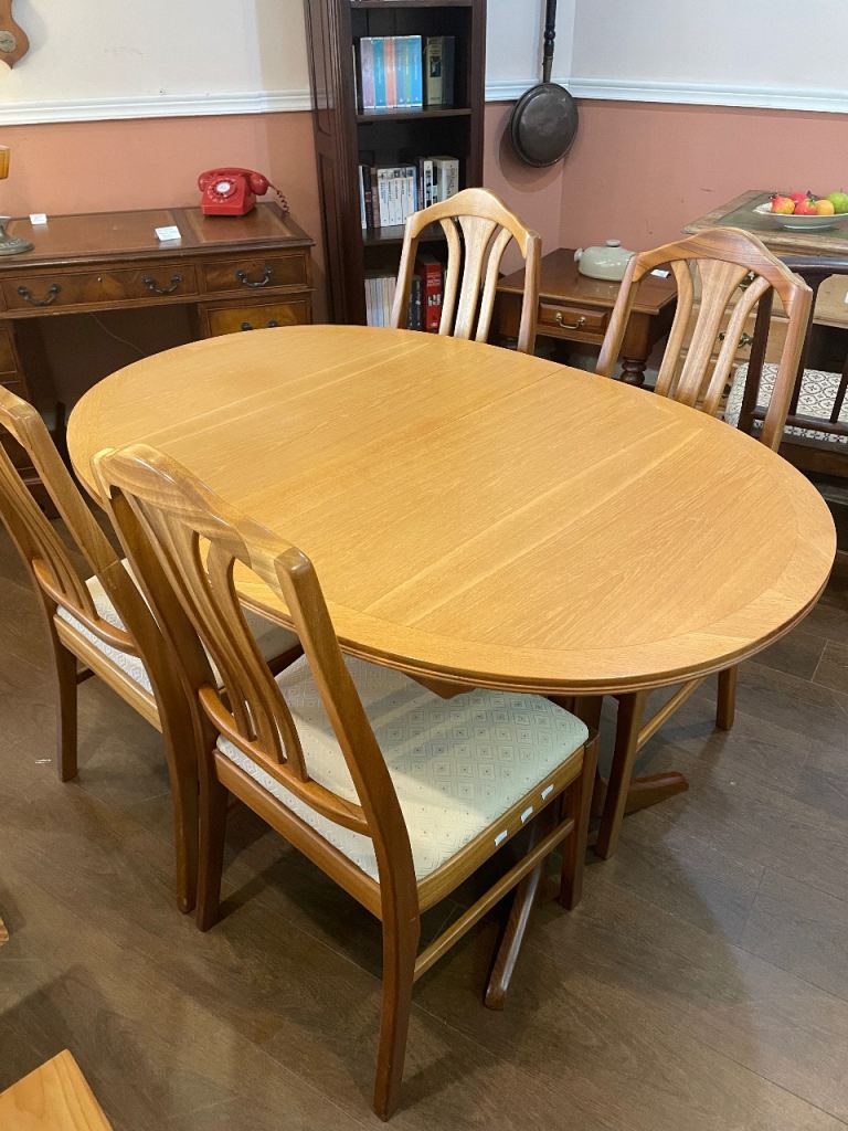 Table and four chairs, mid century Nathan in superb condition. Extending. Lovely colour