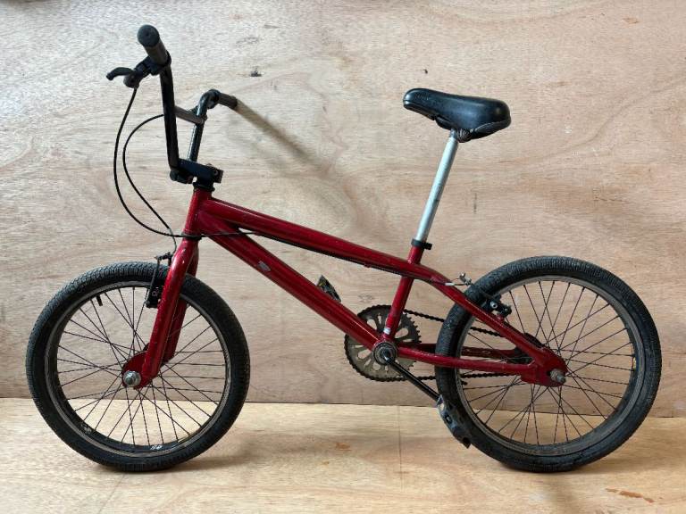 Plain red vintage BMX in good working order. Recently serviced