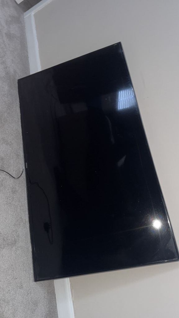 Large Black Flat Screen TV – Good Condition