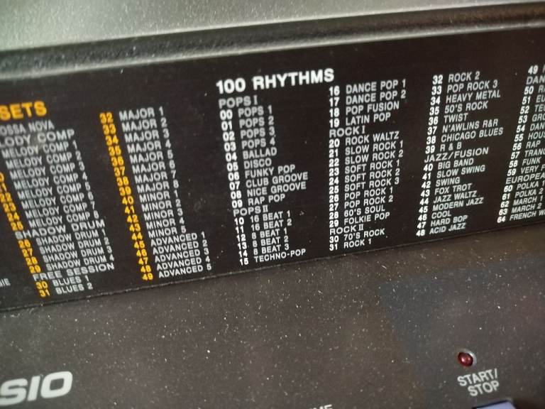 Electric keyboard Casio with power lead and stand in very good condition good working order 