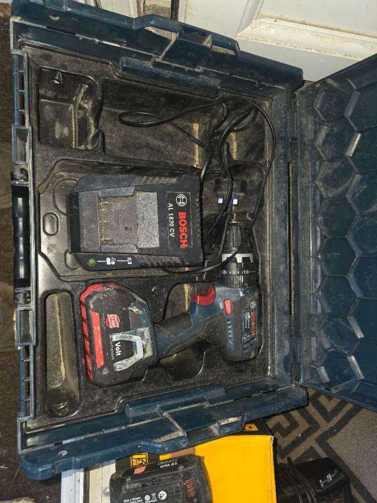 Bosch Cordless Drill with Battery and Charger – Good Condition