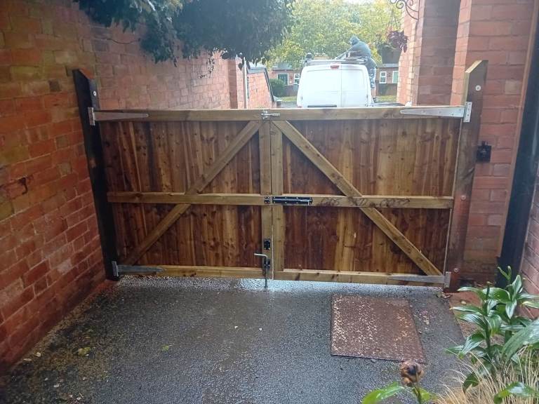 Hand built bespoke treated timber gates.