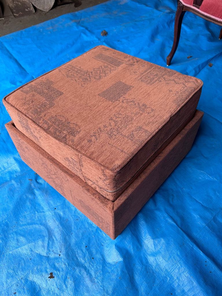 Firm Cushion footstool with solid base on wheels 