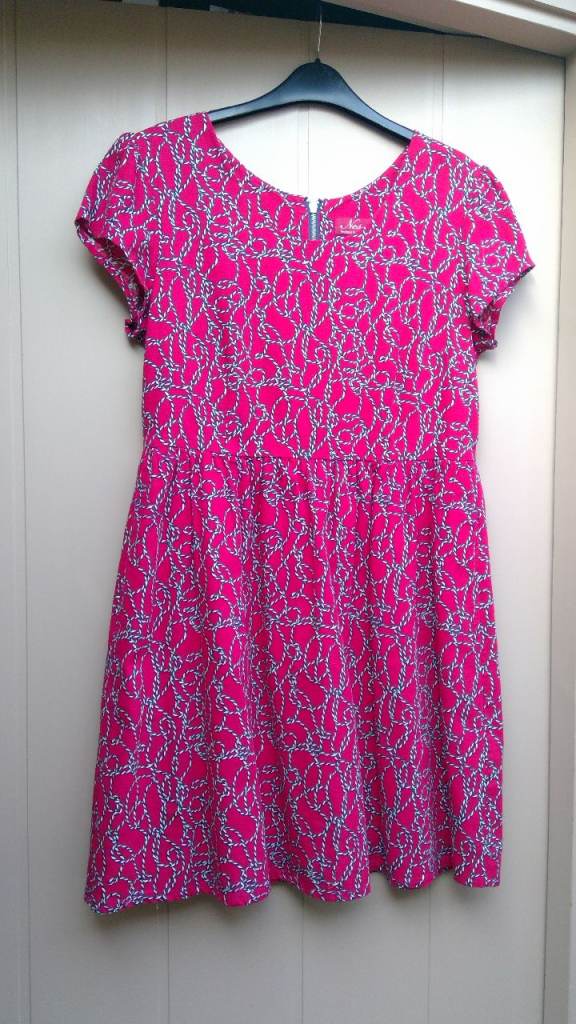 Cap sleeved, scoop necked, fully lined, with concealed pockets, red dress, Size 14