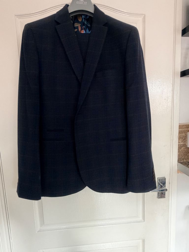 Next 3 piece suit. Worn once 