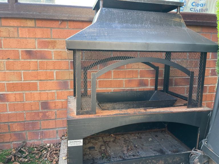 Fire pit log/briquette burner with box of briquettes 