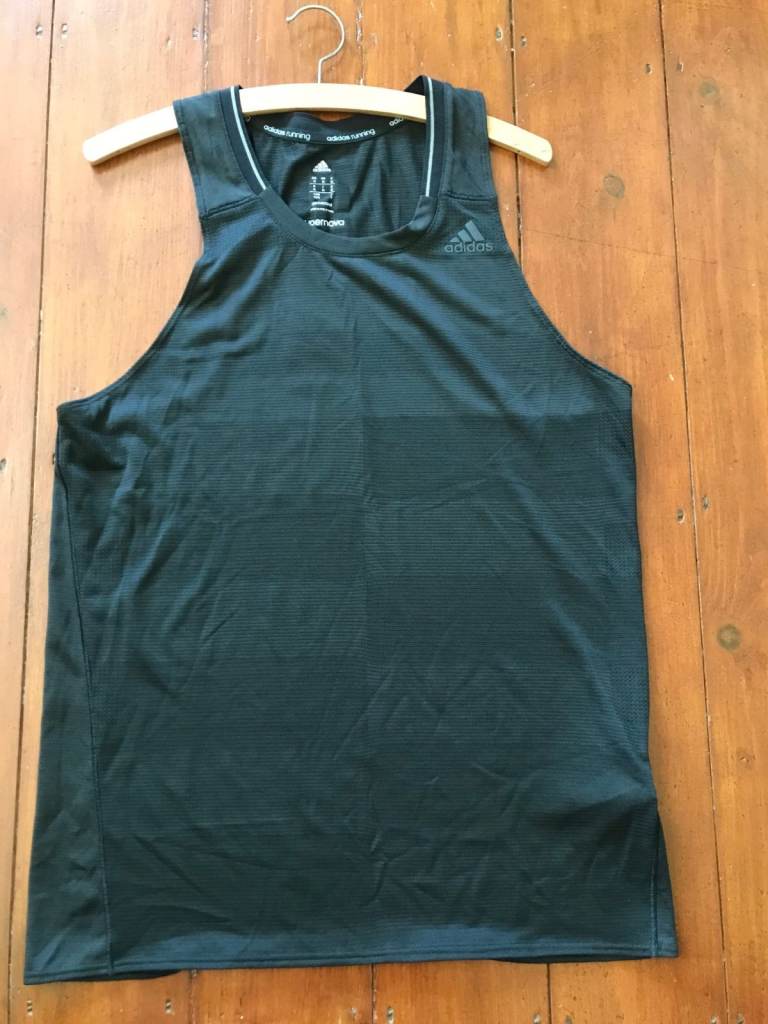 Teenage boy's Adidas polyester running top size medium. Measures chest 38 inch.