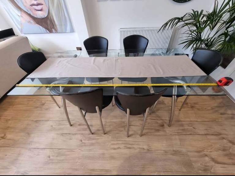 Glass dining table and chairs (180cm x 90cm)