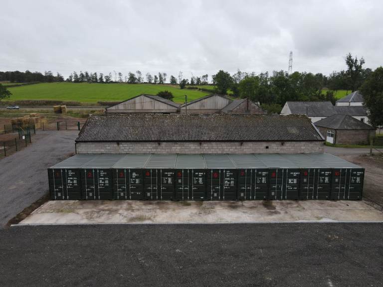 Self storage units. Shipping containers in a secure yard.