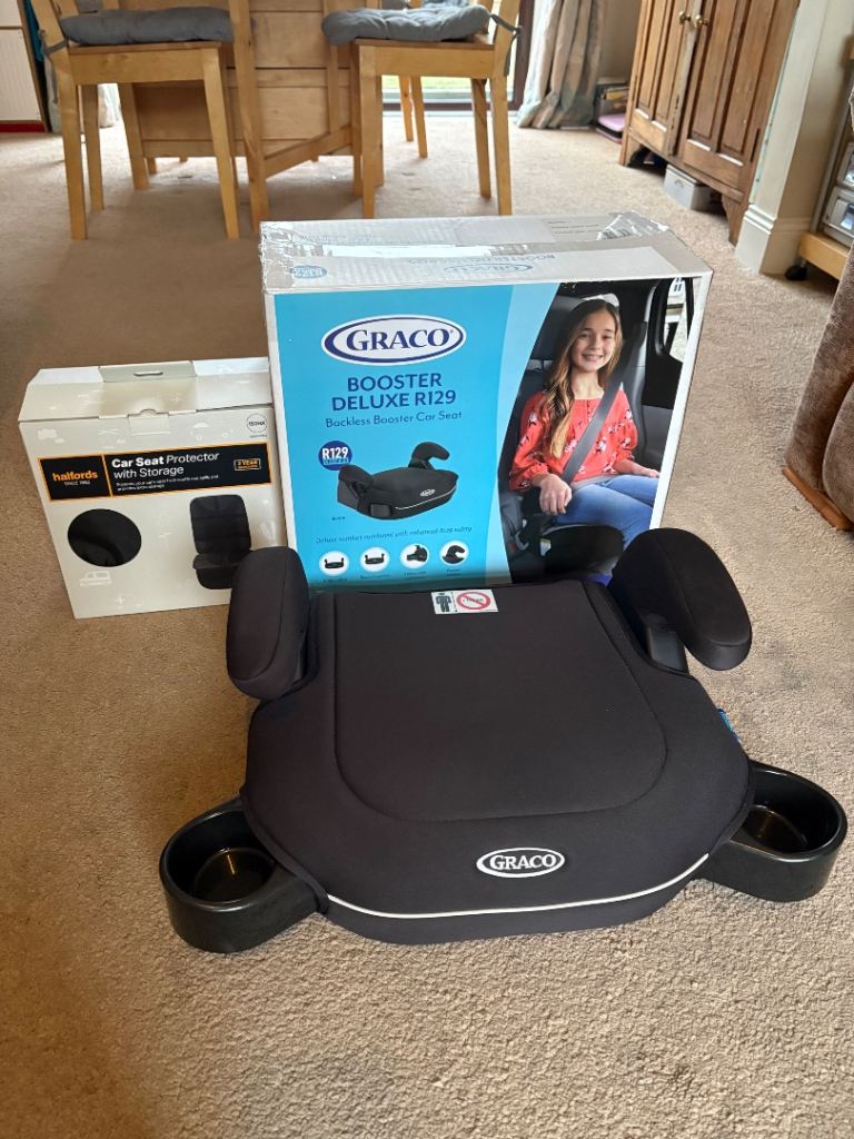 Graco Booster Deluxe with car seat protector 