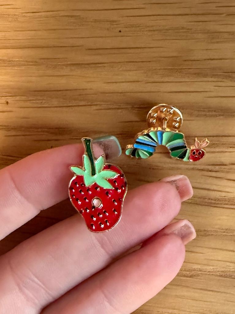 2 x Hungry Caterpillar pin badges brooches 