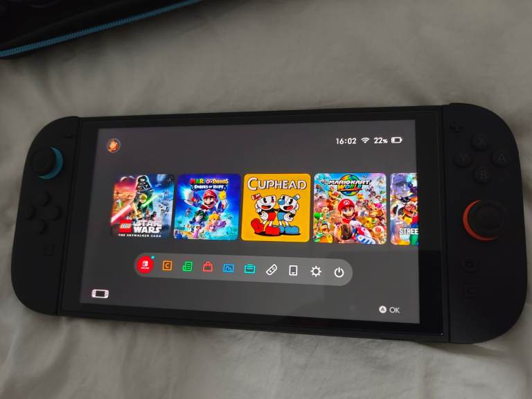 Nintendo Switch Lite Console with Games and Carry Case
