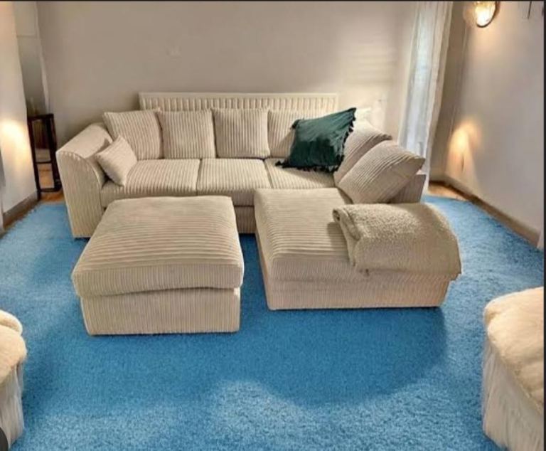 Corner sofa with footstool for £170