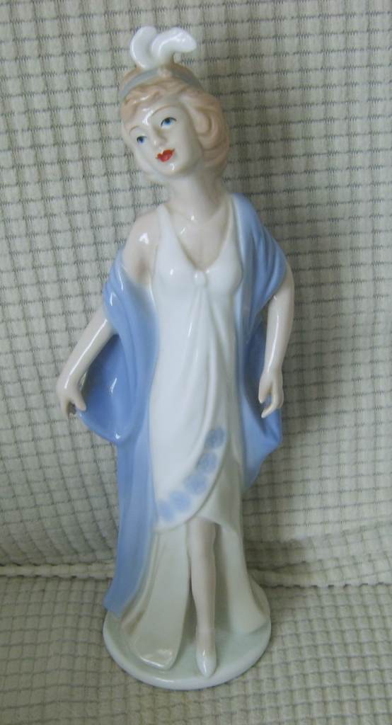 An elegant lady ceramic figure by Cellini.