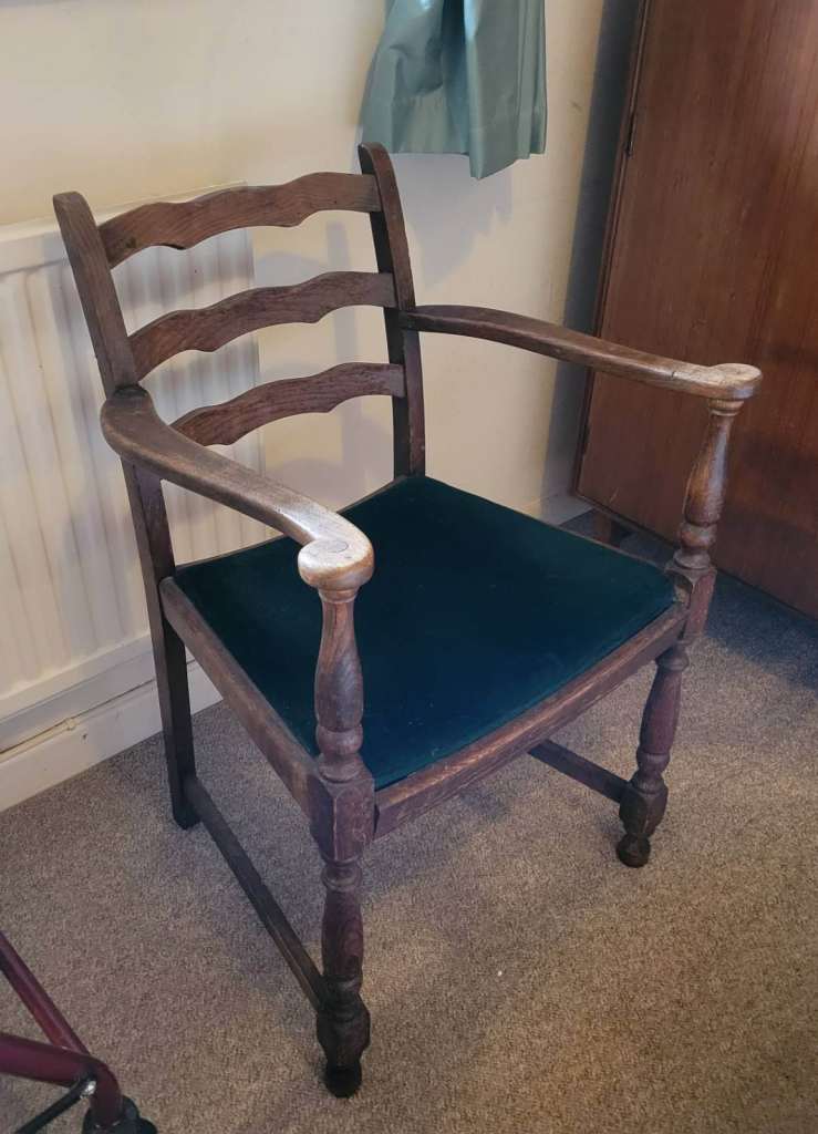 Vintage Carver Chair. Dark green velvet padded seat