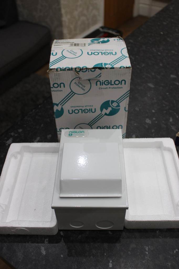 image for Niglon Metal Shower Unit Fitted With RCD 2P 63A 30mA & MCB 1P 850 New Unused