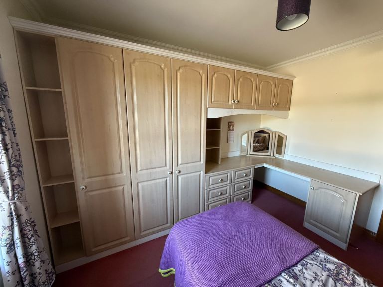 Lovely fitted bedroom units with bedside locker 