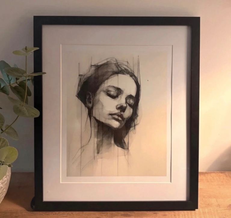 Framed Portrait — Striking Monochrome Charcoal Print of Woman Seeking Peace 