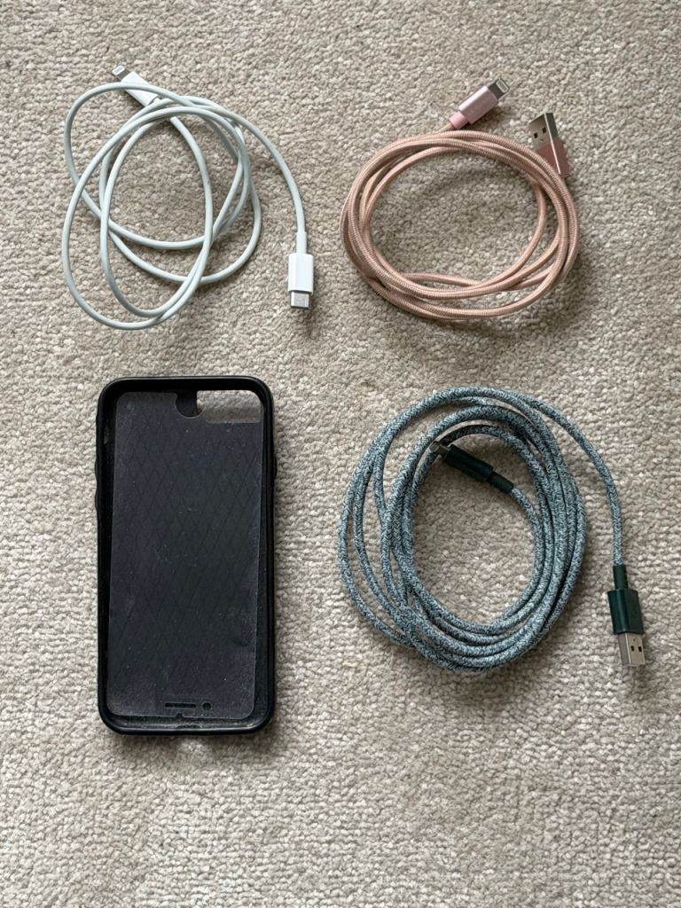 iPhone case and 3 Lightning cables to charge older iPhones.