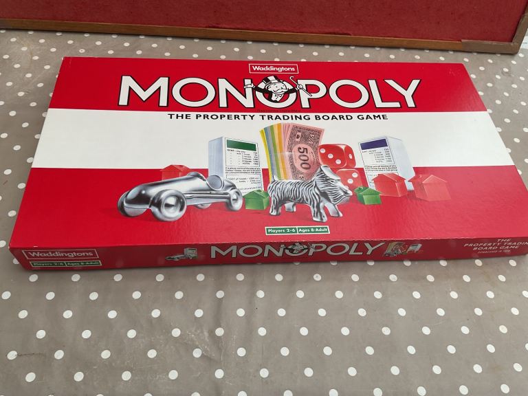 Monopoly opened but unused.
